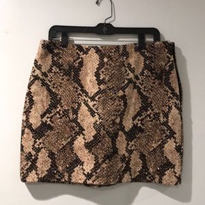 New H&M mini skirt. Brown and tan snake print.